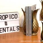 SUJETA LIBROS PIÑA BRONCE